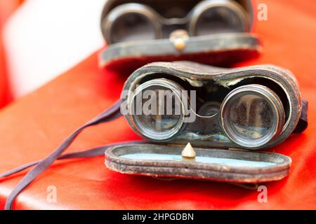 Italy, Lombardy, Flea Market, Ancient Binoculars with Leather Bag Cover Stock Photo