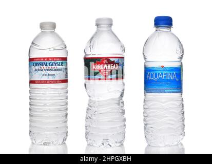 IRVINE, CALIFORNIA - 21 FEB 2022: Three popular brands of bottled water, Crystal Geyser, Aquafina, and Arrowhead. Stock Photo