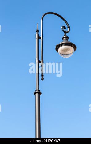 Street lighting lantern with LED lamp against the blue sky Stock Photo