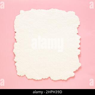 Craft paper on pink background Stock Photo