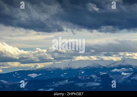 View of the dramatic landscape with snowy mountains. The Kralova Hola, peak in Low Tatras National Park, Slovakia, Europe. Stock Photo