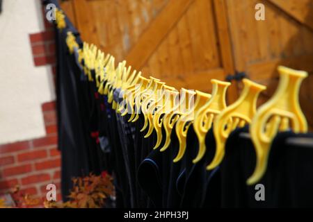 Wash Day, clothes, washing line, blowing dry in wind, back garden, good drying weather, fresh laundry, non tumble dry, old fashioned  way,  line fresh Stock Photo