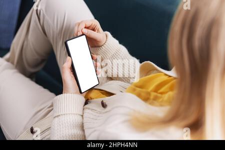 Woman using white screen mobile Stock Photo