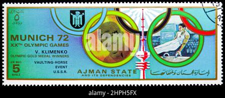 MOSCOW, RUSSIA - NOVEMBER 4, 2021: Postage stamp printed in Ajman shows Viktor Jakovlevitsch Klimenko (1949), USSR, Summer Olympic Games 1972 - Munich Stock Photo