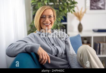 Indoors portrait of happy woman Stock Photo