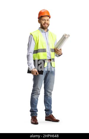 Full length portrait of a male engineer holding a blueprint and  clipboard isolated on white background Stock Photo