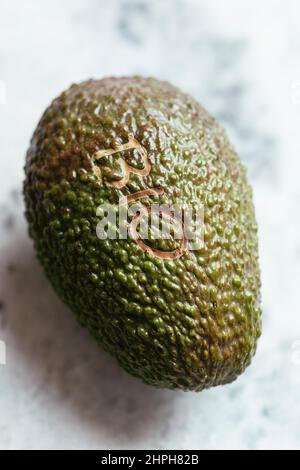 Organic avocado fruit with the word bio on it.