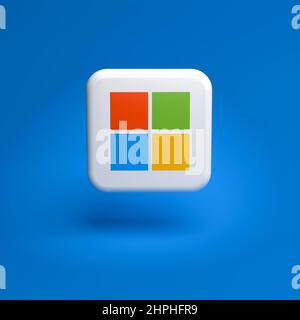 Logo of the tech company Microsoft on a tile hovering over a seamless blue background Stock Photo