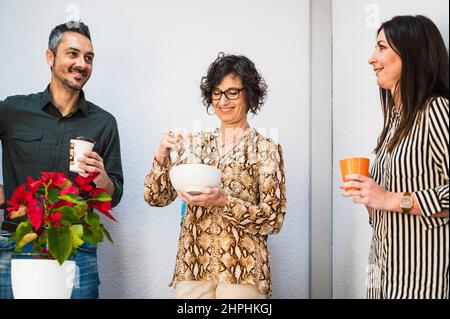 Group of office workers taking a lunch break. Stock Photo