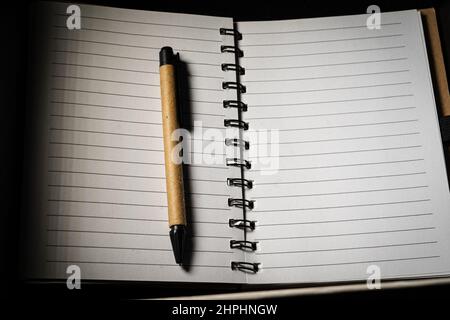 an agenda notebook with a pen Stock Photo