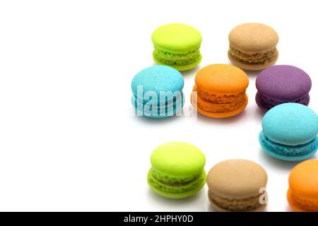 Sweet colourful  macaroons isolated on white background Stock Photo
