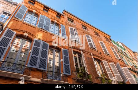 Facades of houses in Toulouse, in Haute Garonne, in Occitanie, France Stock Photo