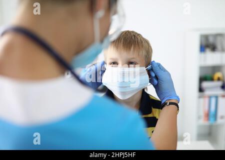 Blue gloves on woman Stock Photo