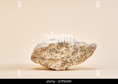 Natural granit stone on beige background, minimal product podium Stock Photo