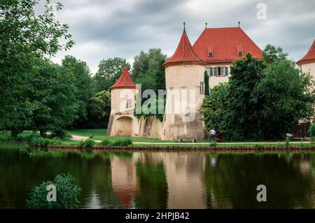 Blutenburg Castle in Munich. View of the castle and the pond in front of it Stock Photo