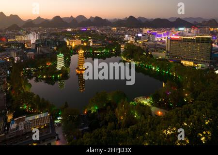 Guangxi guilin twin towers at night Stock Photo