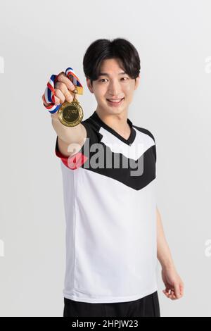 volleyball sports player, asian korean man with medal Stock Photo