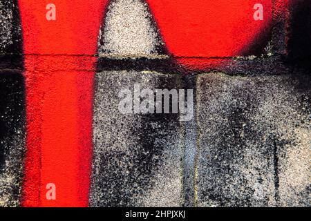 Red Black Paint Weathered Grunge Stone Wall Old Rough Background Texture Stock Photo