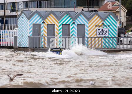 Flooding during a high surge tide combined with Storm Franklin in Southend on Sea, Essex, UK. Toilet block just above the water line Stock Photo