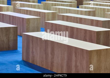 Wooden seats on a conference indoor hall. Empty place Stock Photo