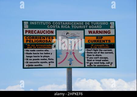 Warning for currents, Tamarindo beach, Tamarindo, Republic of Costa Rica, Central America Stock Photo