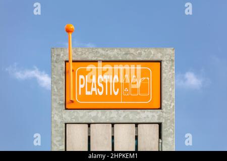 Plastic disposal container in front of a blue sky in The Netherlands Stock Photo