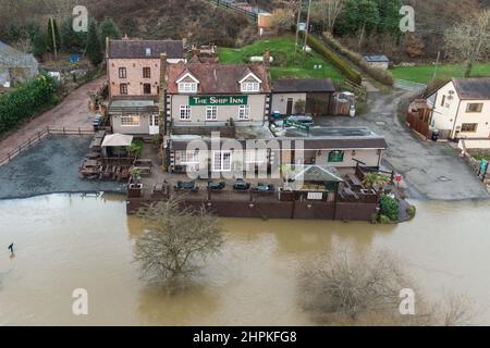 Highley, Shropshire February 22nd 2022. The River Severn laps at the shore of The Ship Inn in Highley, Shropshire after the river bursts its banks due to torrential rain from Storm Franklin. Pic by Credit: Stop Press Media/Alamy Live News Stock Photo