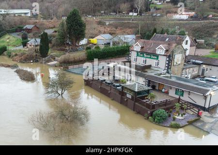 Highley, Shropshire February 22nd 2022. The River Severn laps at the shore of The Ship Inn in Highley, Shropshire after the river bursts its banks due to torrential rain from Storm Franklin. Pic by Credit: Stop Press Media/Alamy Live News Stock Photo