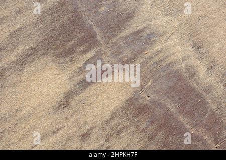 Different coloured sands on Whitby Beach.  Yorkshire. Stock Photo