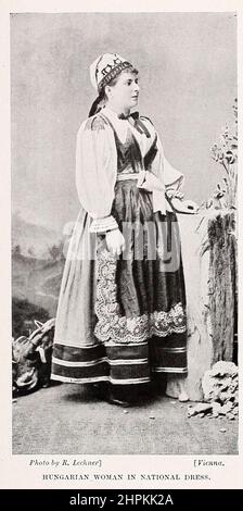 HUNGARIAN WOMAN IN NATIONAL DRESS from the book ' The living races of mankind ' a popular illustrated account of the customs, habits, pursuits, feasts & ceremonies of the races of mankind throughout the world by Sir Harry Hamilton Johnston, and Henry Neville Hutchinson Published in London by Hutchinson & Co. in 1902 Stock Photo