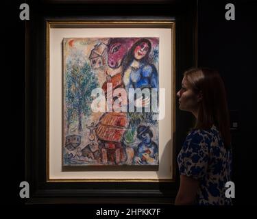 Sotheby’s, London, UK. 22 February 2022. Mastepieces by Magritte, Monet, Picasso, Hockney, van Gogh, Renoir and Banksy on display for the Modern & Contemporary Evening Auction and Now Evening Auction on 2 March in London. Image: Marc Chagall, Paysage à l’Isba. Estimate: £1,500,000-2,000,000. Credit: Malcolm Park/Alamy Live News Stock Photo