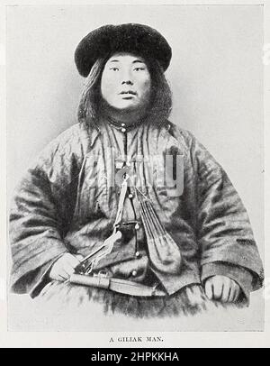A Giliak man The Nivkh, or Gilyak (also Nivkhs, or Gilyaks) are an indigenous ethnic group inhabiting the northern half of Sakhalin Island and the lower Amur River and coast on the adjacent Russian mainland and historically possibly parts of Manchuria. from the book ' The living races of mankind ' a popular illustrated account of the customs, habits, pursuits, feasts & ceremonies of the races of mankind throughout the world by Sir Harry Hamilton Johnston, and Henry Neville Hutchinson Volume 2 Published in London by Hutchinson & Co. in 1902 Stock Photo