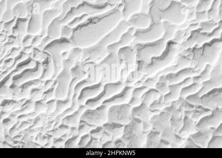 White texture of Pamukkale calcium travertine in Turkey, abstract pattern of close-up Stock Photo