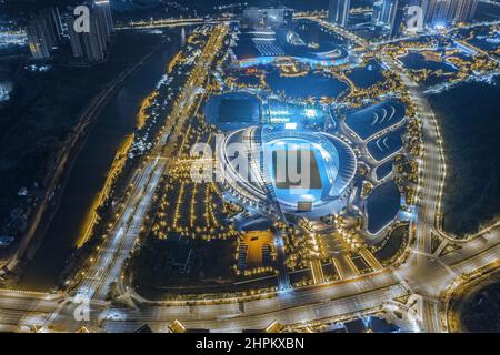 Jiangmen city skyline binjiang district sports center night Stock Photo