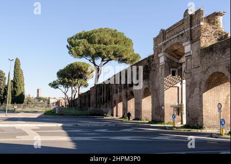 Porta San Giovanni, or Saint John gate, a defensive city wall from ancient medieval times, now with arches crossing over a highway near Saint John in Stock Photo