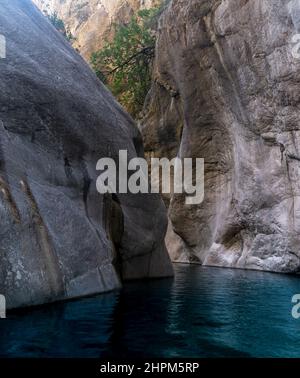 rocky canyon with clear blue water in Goynuk, Turkey Stock Photo