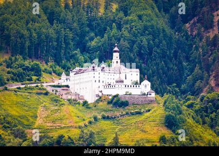 Abbey of Monte Maria in Alpine village of Burgeis view, Trentino Alto Adige region of Italy Stock Photo