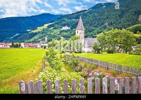 Idyllic alpine village of Burgeis and Abbey of Monte Maria view, Trentino Alto Adige region of Italy Stock Photo