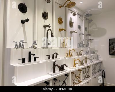 Orlando, FL USA -  December 2,  2020: The bathroom and kitchen faucet style and color choices at a home builder design studio in Orlando, Florida. Stock Photo