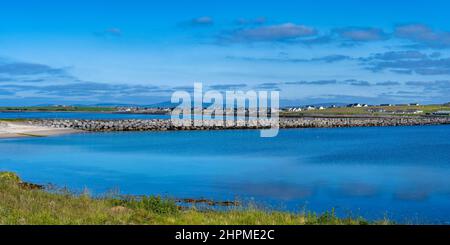 Panoramic view of Churchill Barrier causeway from Lamb Holm looking towards Mainland Orkney in Scotland, UK Stock Photo