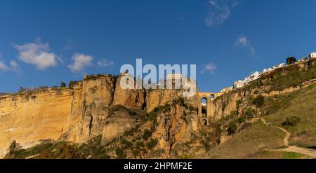 A panorama aerial view of the old town of Ronda and the Puente Nuevo over El Tajo Gorge Stock Photo