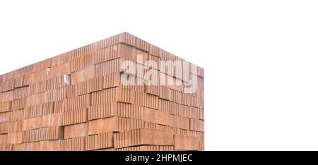 A bunch of brick blocks of building stone material on a white background, isolated. Stock Photo