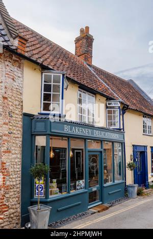 Local style architectural style roadside delicatessen shop in Blakeney, a small coastal village in north coast Norfolk, East Anglia, England Stock Photo