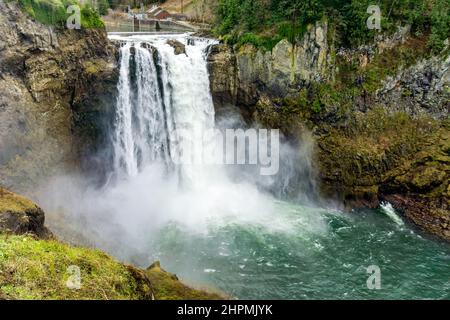 Roaring and misty Snoqualmie Falls in Washington State. Stock Photo