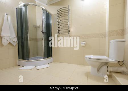 Bukovel, Ukraine February 4, 2022: bathroom with hydrobox, light style interior of the bathroom, baths in Bukovel hotels. Stock Photo