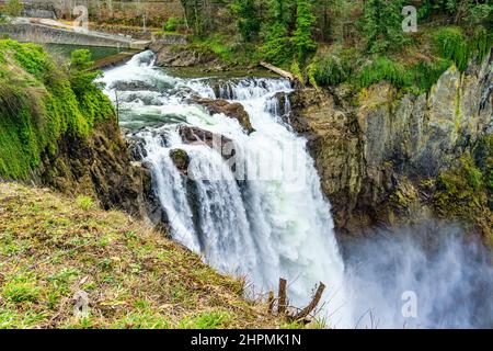 Roaring and misty Snoqualmie Falls in Washington State. Stock Photo