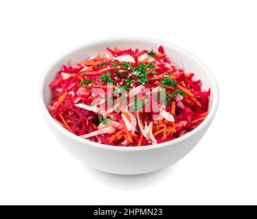 Salad with beets, cabbage, carrots and sesame isolated on a white background. Side view. Healthy, vitamin salad. Stock Photo