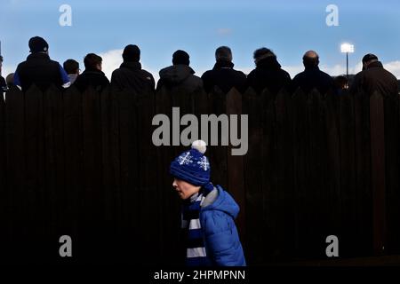 A young fan of of Bath Rugby on his way to entering the Recreation Ground, 'the Rec', Bath Rugby's field. Bath, Somerset, England. Stock Photo