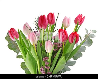 beautiful flower bouquet with mixed rosa an red tulips, fresh cut bouquet isolated on white background, close up Stock Photo