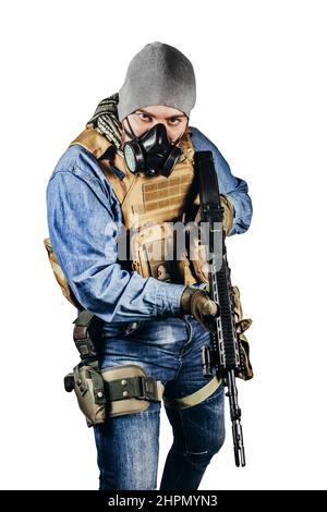 Isolated photo of urban soldier in tactical military outfit and gas mask  standing with rifle and gas mask white background Stock Photo - Alamy